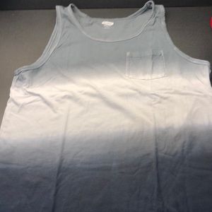 Garment dyed tank top with pocket.
